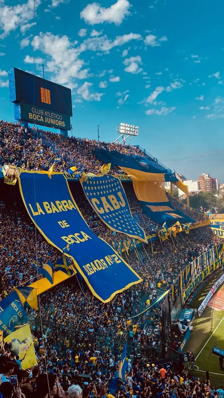 La Bombonera packed, with a giant club flag.